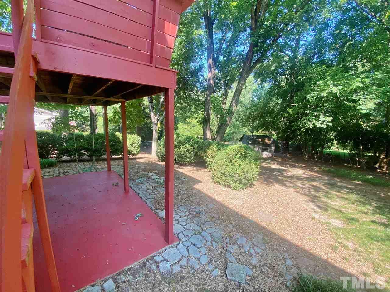 7919 Harps Mill Road Raleigh, NC 27615 - Photo 29 of 29 a view of a backyard with porch