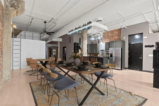 a view of a dining room with furniture