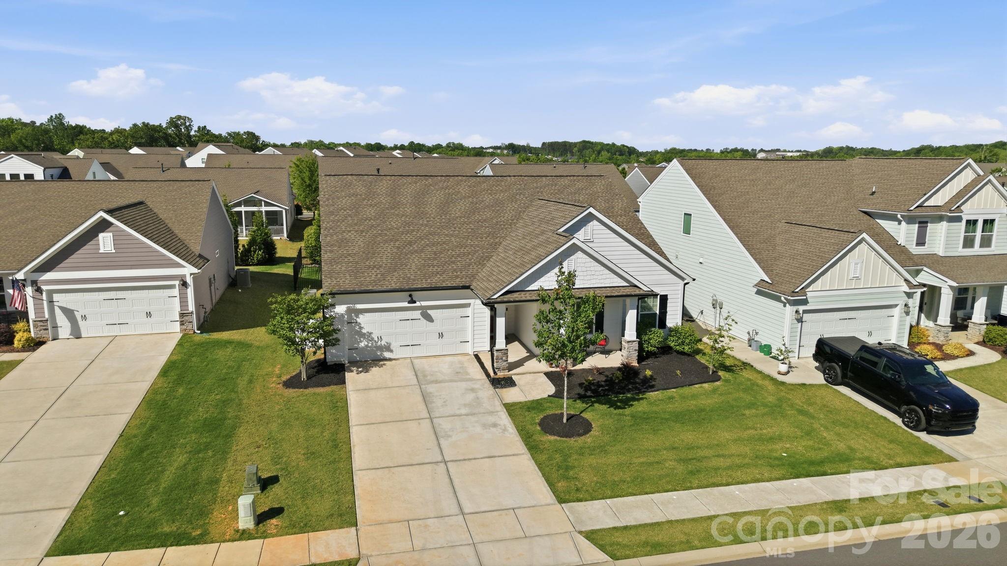 6038 Holland Street Fort Mill, SC 29707 - Photo 39 of 48 a front view of a house with a yard