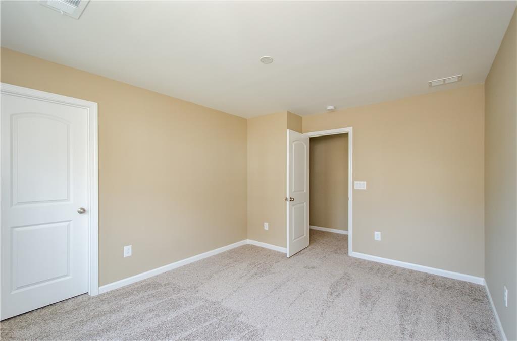 8555 Scenic Ridge Way Ball Ground, GA 30107 - Photo 40 of 74 a view of an empty room