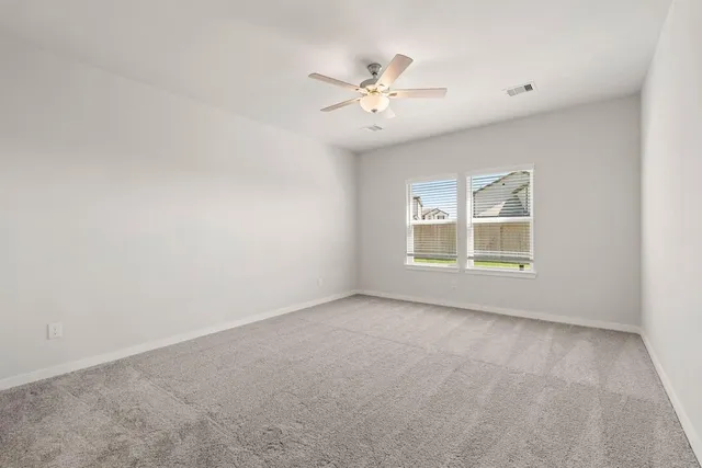 a bathroom with a shower and a sink