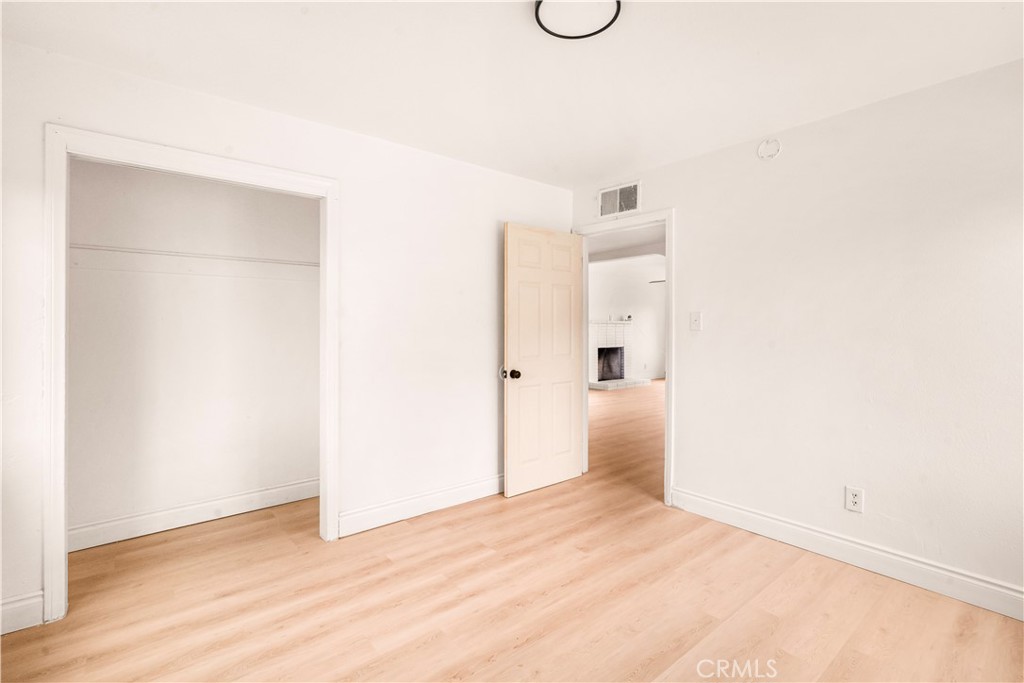 407 4th Street Bakersfield, CA 93304 - Photo 20 of 31 a view of a room with wooden floor and white walls