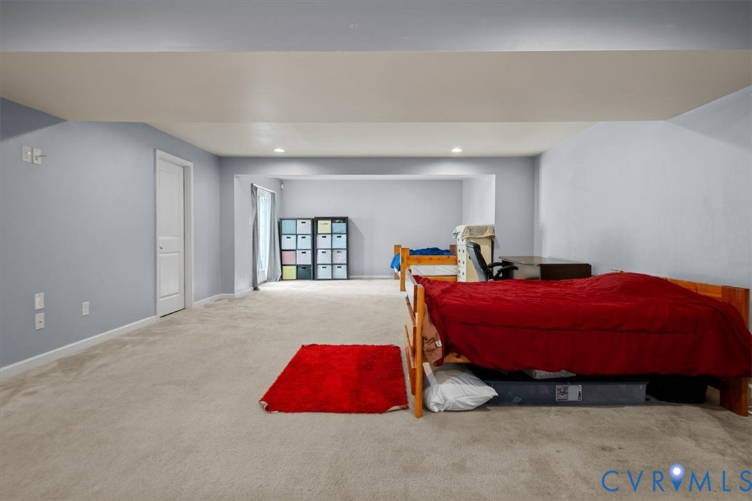 9013 Bailey Hill Road Midlothian, VA 23112 - Photo 52 of 56 Expansive carpeted room featuring recessed lightin