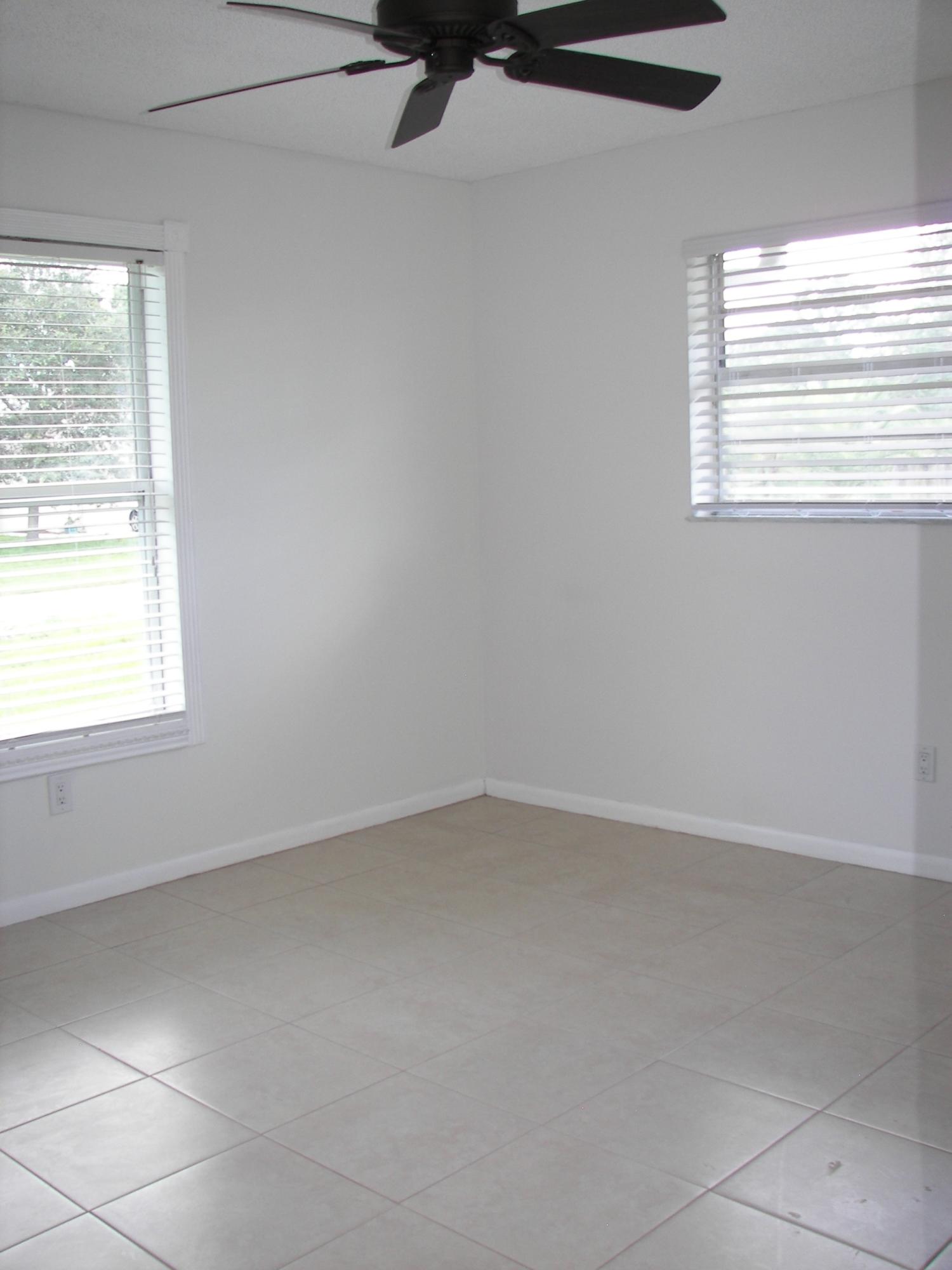 650 Northwest Selvitz Road Port St. Lucie, FL 34983 - Photo 22 of 24 an empty room with a window