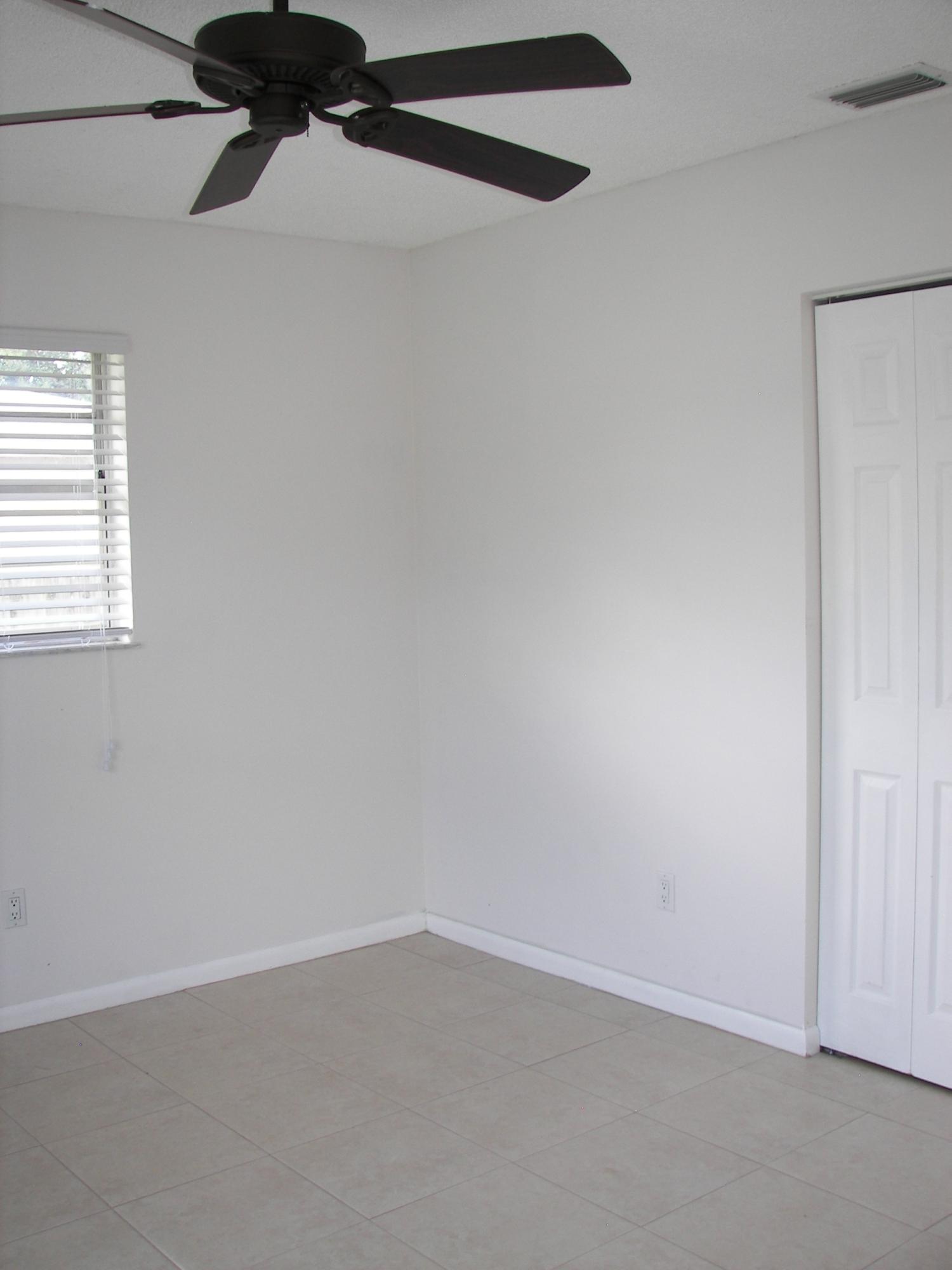 650 Northwest Selvitz Road Port St. Lucie, FL 34983 - Photo 23 of 24 an empty room with a window