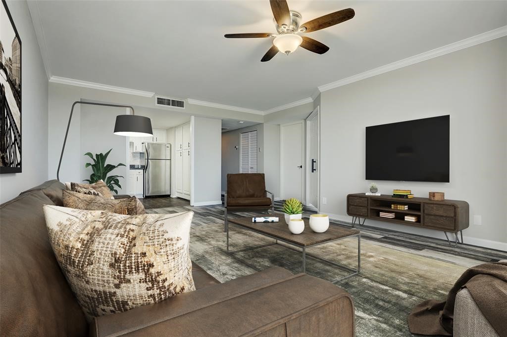 2016 Main Street, Unit 2204 Houston, TX 77002 - Photo 7 of 21 a living room with furniture and a flat screen tv