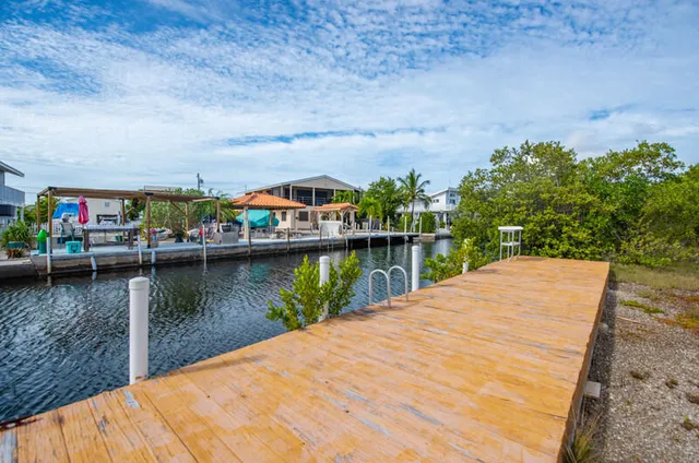 a view of balcony with furniture