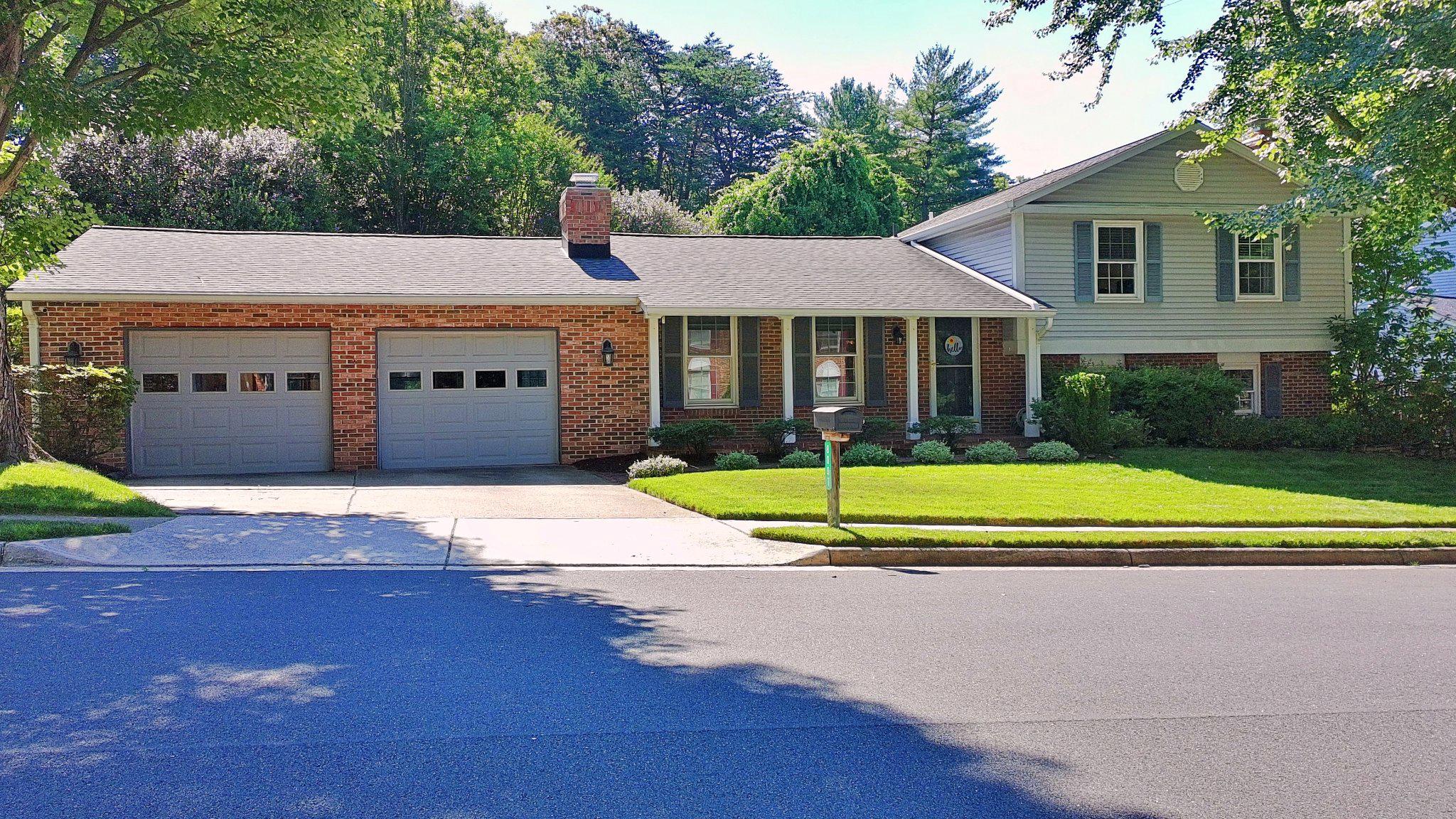 Charming curb appeal with mature trees