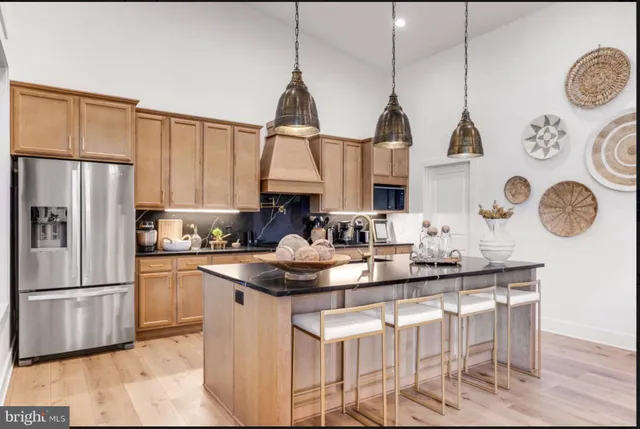 a bathroom with double sink and a mirror