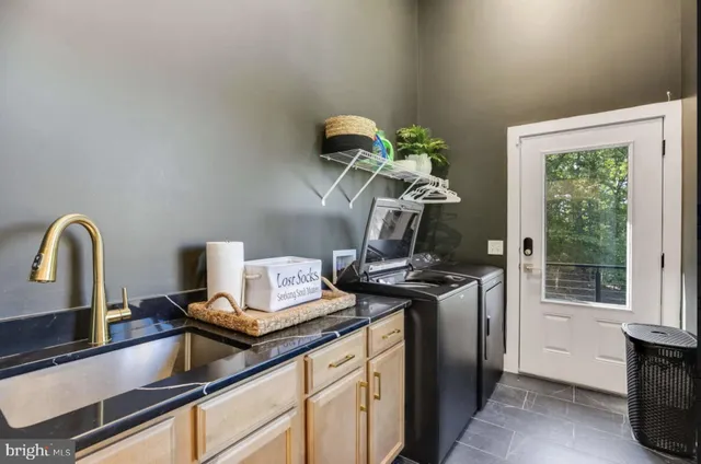 a bedroom with furniture and a potted plant