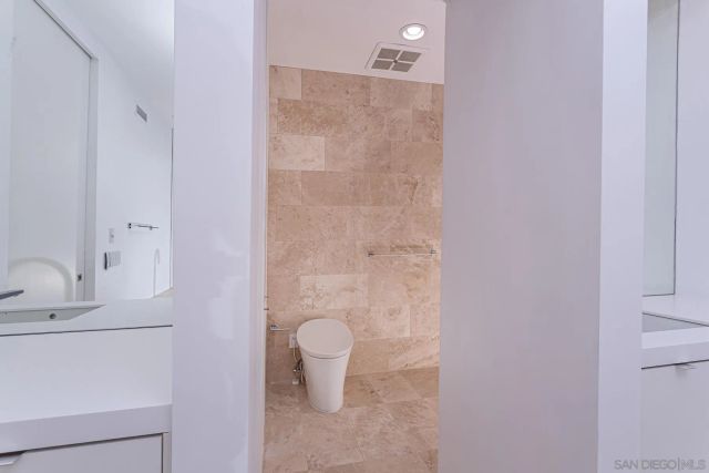 a view of a city with tall buildings