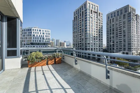 a view of a city with tall buildings