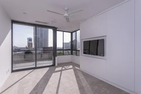 a view of a balcony with chairs