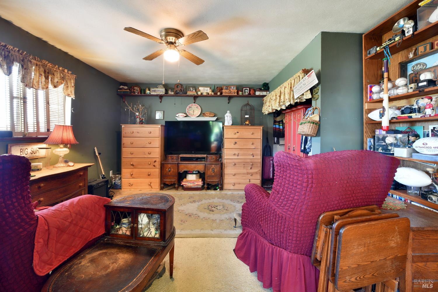 148 Millbrae Avenue Santa Rosa, CA 95407 - Photo 20 of 29 a living room with furniture workspace and a window