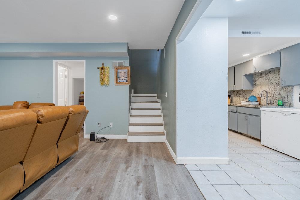 1793 Cherokee Drive, Unit 2 Salinas, CA 93906 - Photo 2 of 20 a room with a couch and a wooden floor