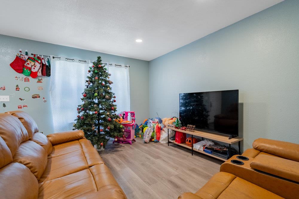 1793 Cherokee Drive, Unit 2 Salinas, CA 93906 - Photo 3 of 20 a living room with furniture and a flat screen tv
