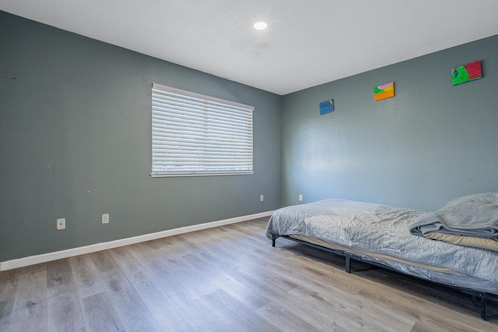 1793 Cherokee Drive, Unit 2 Salinas, CA 93906 - Photo 9 of 20 a bedroom with a bed and a window