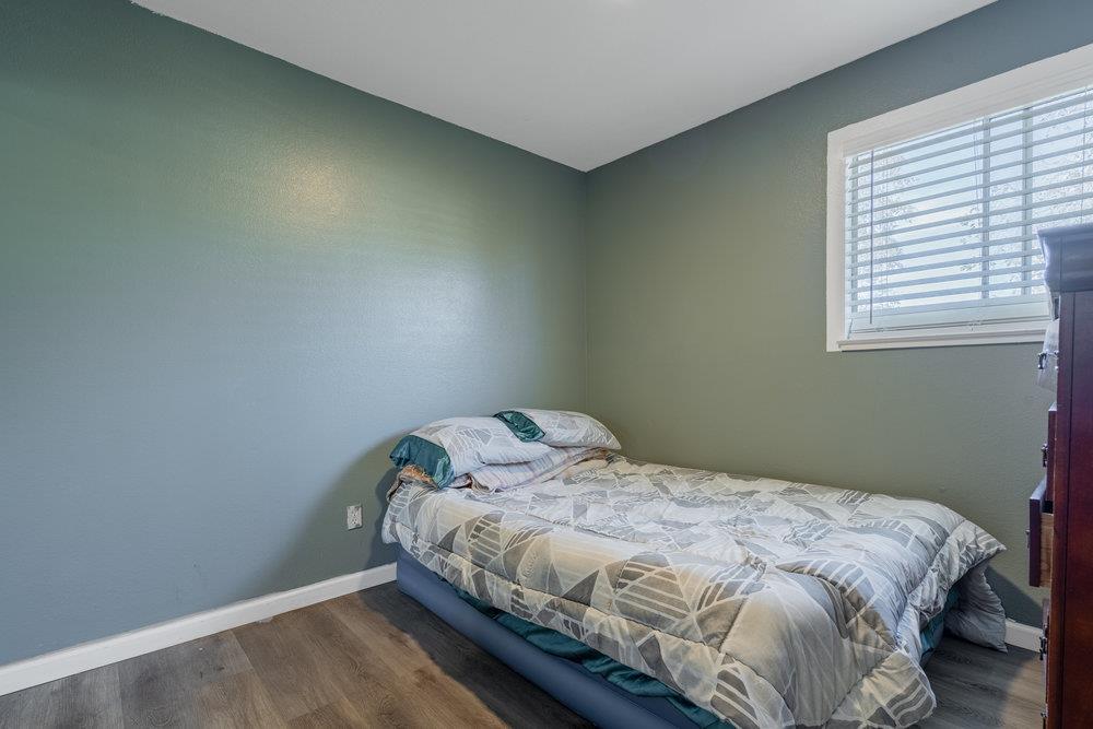 1793 Cherokee Drive, Unit 2 Salinas, CA 93906 - Photo 10 of 20 a bedroom with a bed and a window