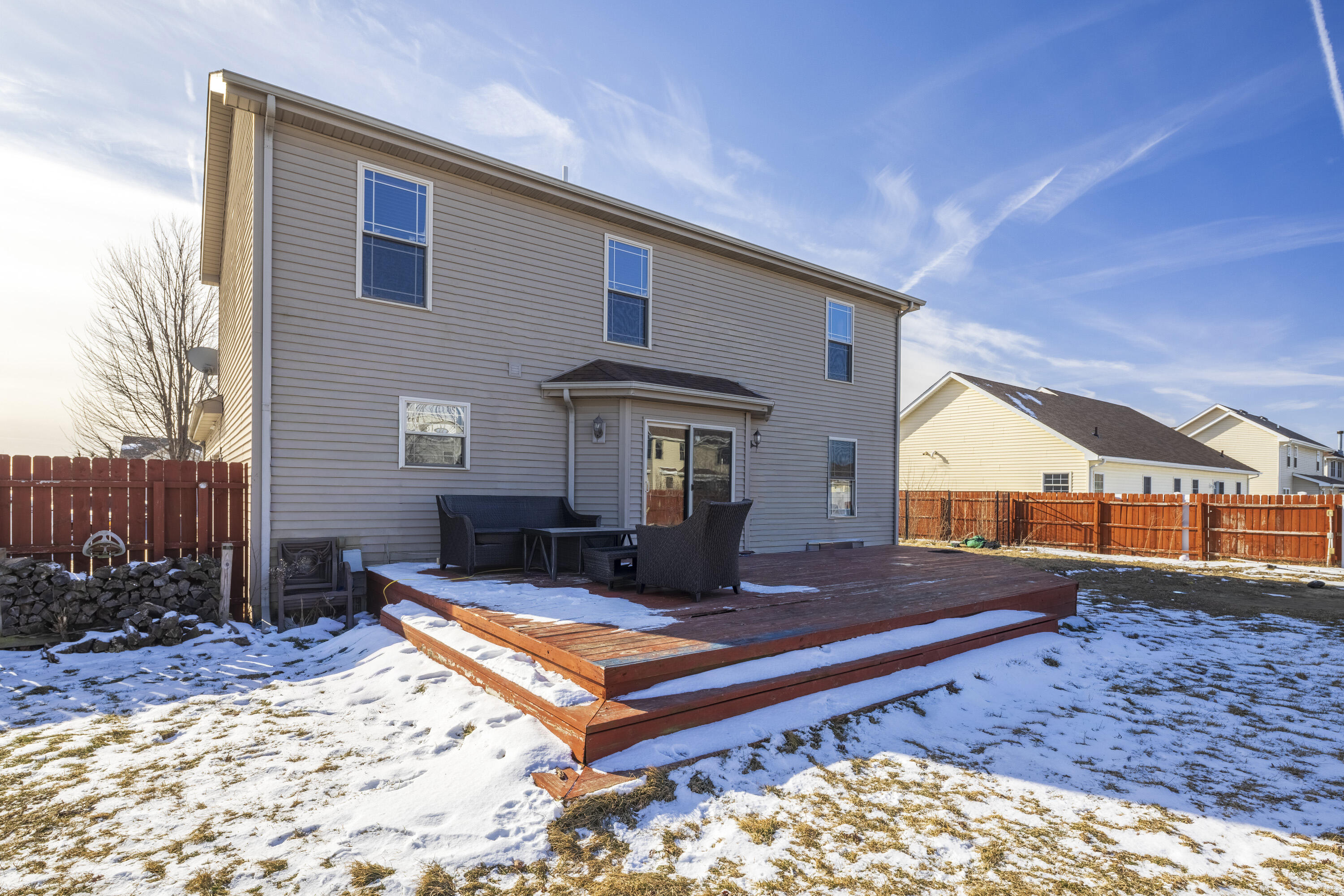 704 Coach Light Lane Lowell, IN 46356 - Photo 27 of 34 a view of a house with backyard and sitting area
