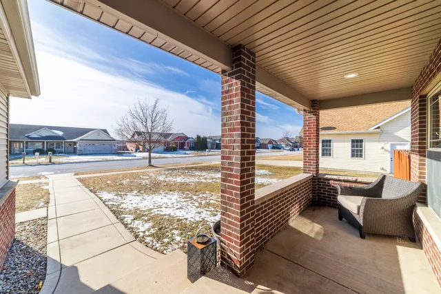 a view of swimming pool with outdoor seating