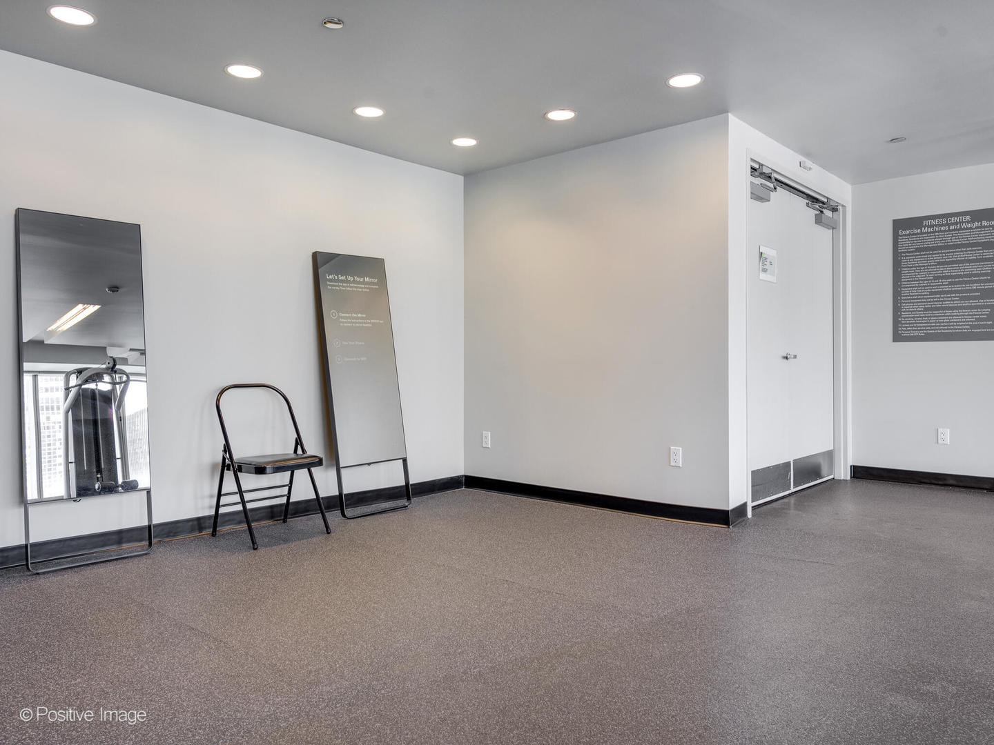 340 East Randolph Street, Unit 2402 Chicago, IL 60601 - Photo 20 of 26 a view of a room with gym equipment