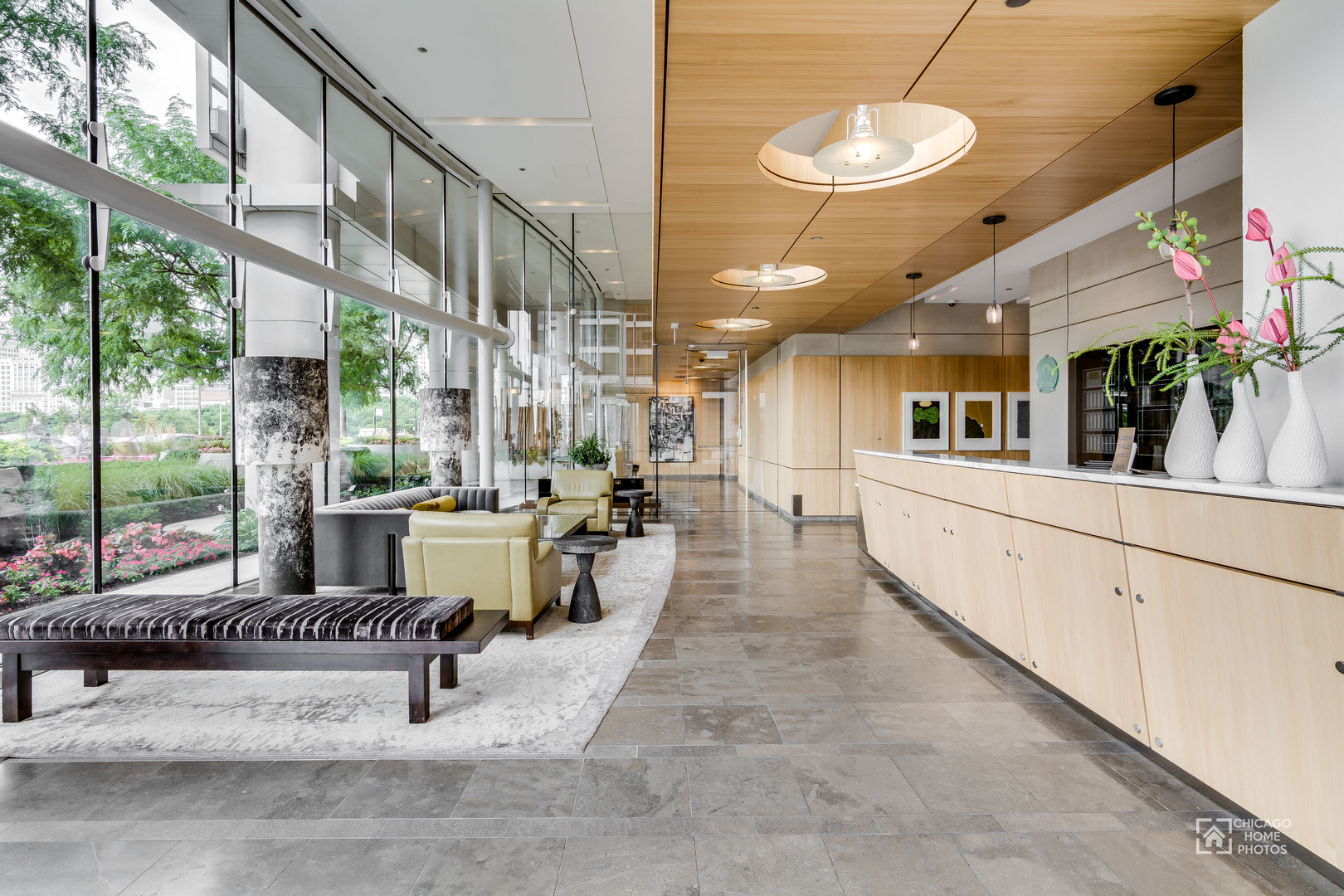340 East Randolph Street, Unit 2402 Chicago, IL 60601 - Photo 25 of 26 a lobby with furniture and a large window