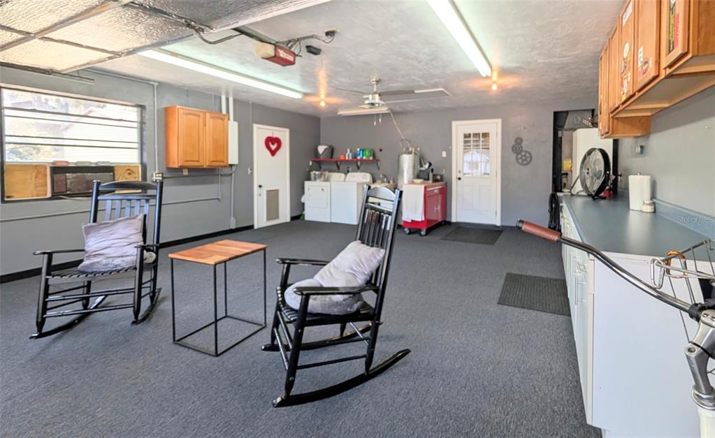 148 Serena Road DeBary, FL 32713 - Photo 20 of 25 a living room with furniture a flat screen tv and next to a window