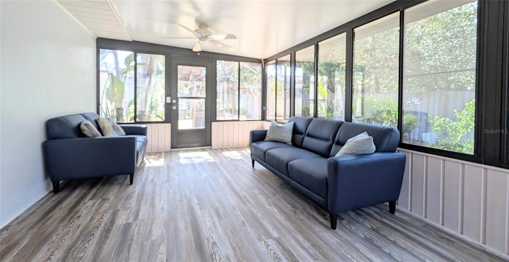 148 Serena Road DeBary, FL 32713 - Photo 21 of 25 a living room with furniture and a large window