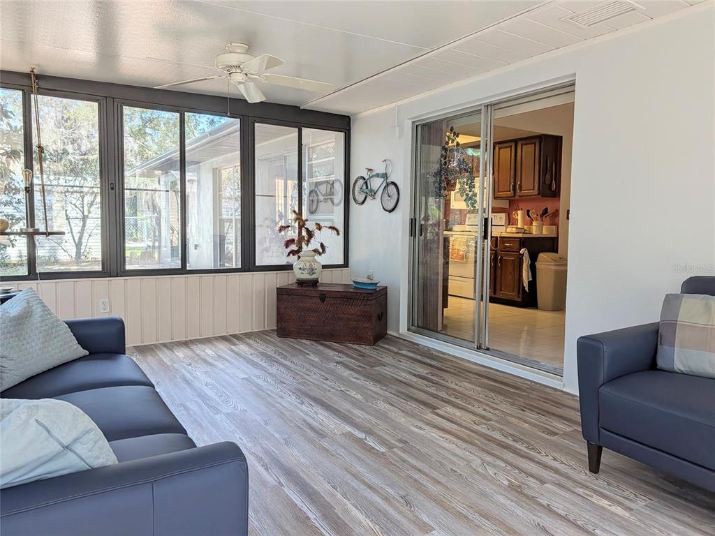 148 Serena Road DeBary, FL 32713 - Photo 23 of 25 a living room with furniture and a large window