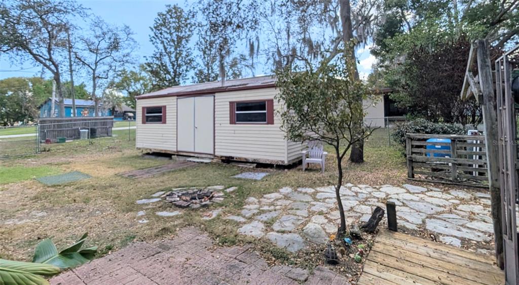 148 Serena Road DeBary, FL 32713 - Photo 25 of 25 a view of a house with a yard