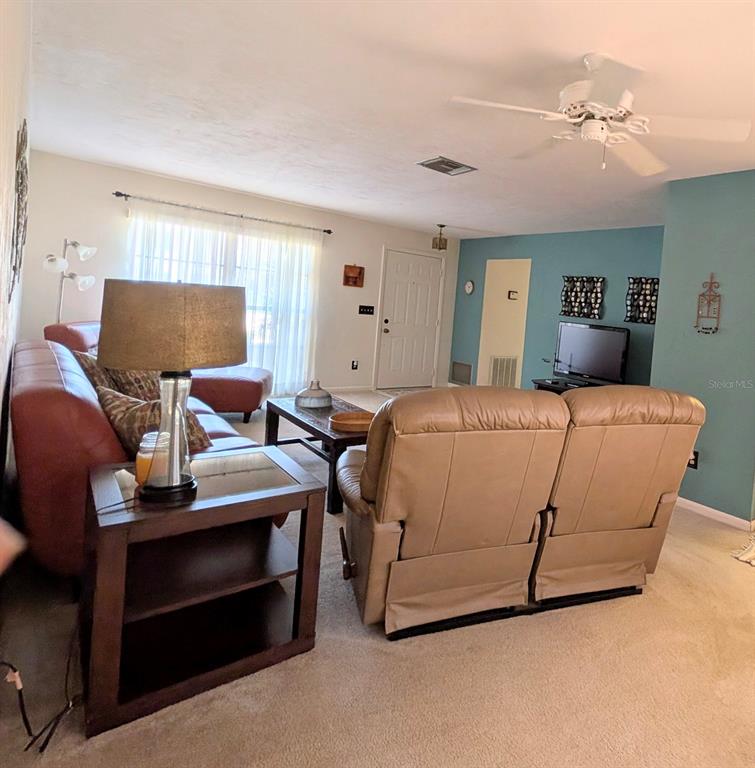 148 Serena Road DeBary, FL 32713 - Photo 5 of 25 a bedroom with a bed and window