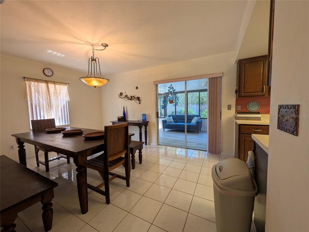 148 Serena Road DeBary, FL 32713 - Photo 6 of 25 a view of a dining room with furniture