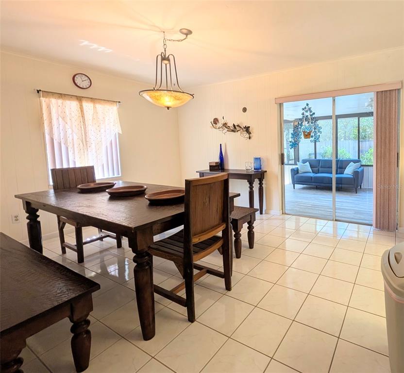 148 Serena Road DeBary, FL 32713 - Photo 8 of 25 a view of a dining room with furniture
