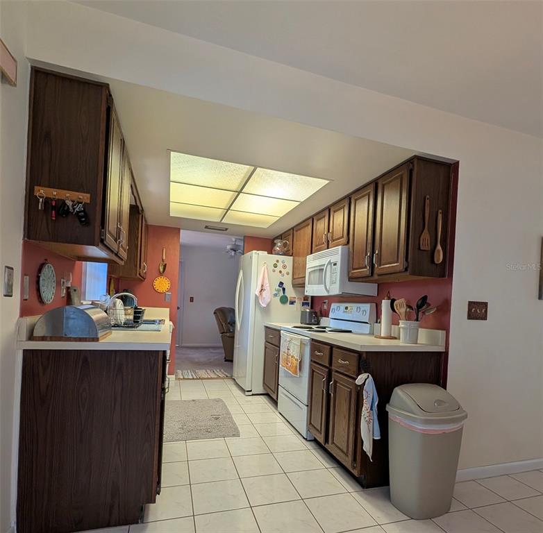 148 Serena Road DeBary, FL 32713 - Photo 9 of 25 a kitchen that has a sink and a stove