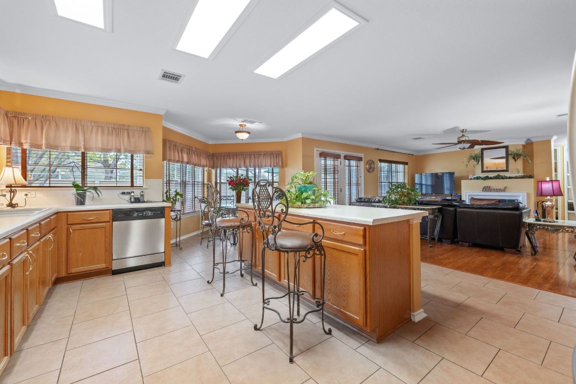 2210 Rachel Ridge Cedar Park, TX 78613 - Photo 15 of 40 a kitchen with stainless steel appliances lots of counter top space
