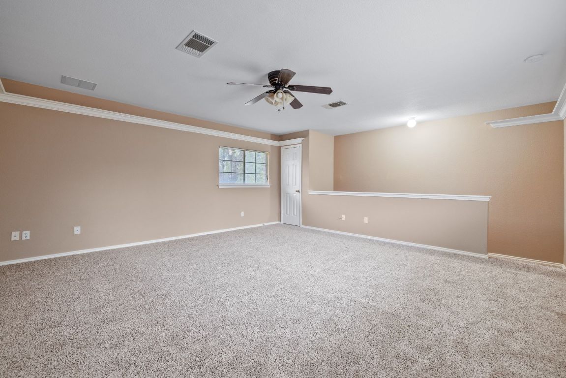 2210 Rachel Ridge Cedar Park, TX 78613 - Photo 22 of 40 a view of an empty room with a window