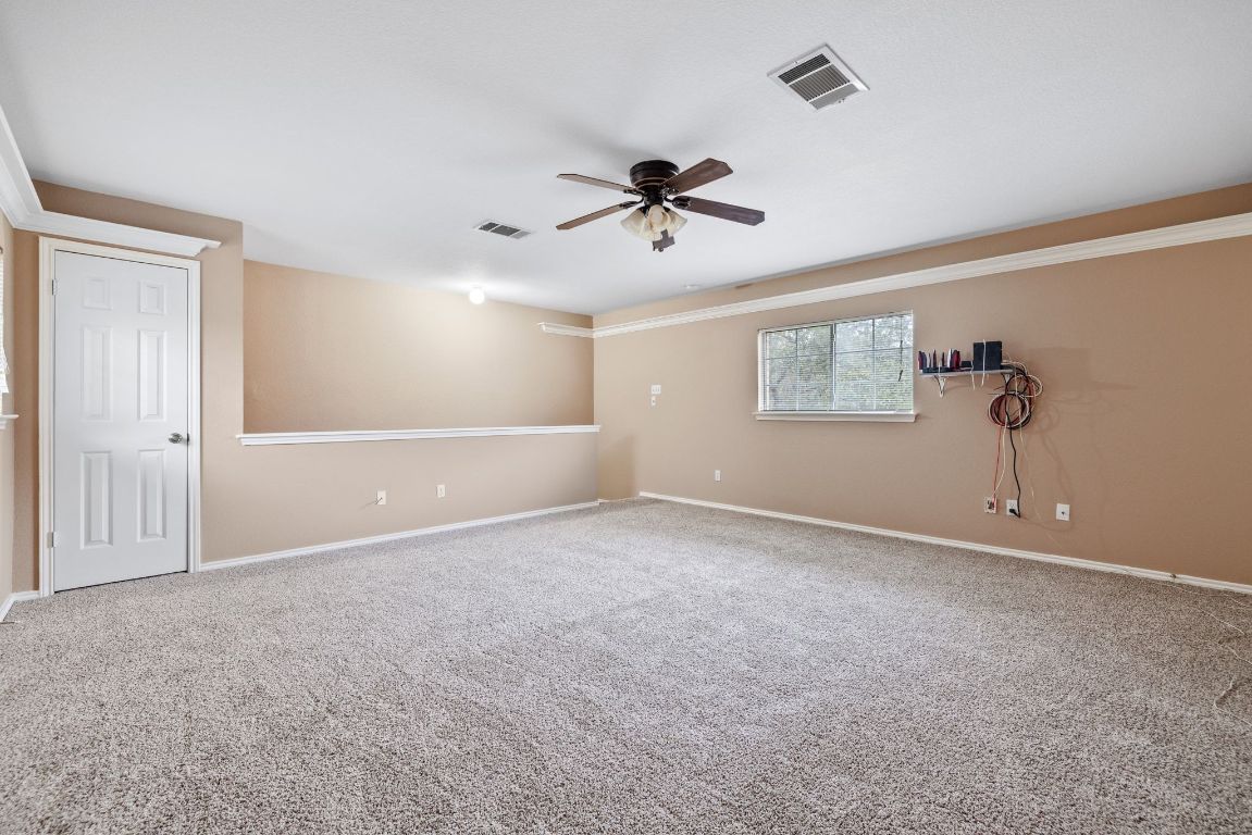 2210 Rachel Ridge Cedar Park, TX 78613 - Photo 23 of 40 a view of an empty room with a window