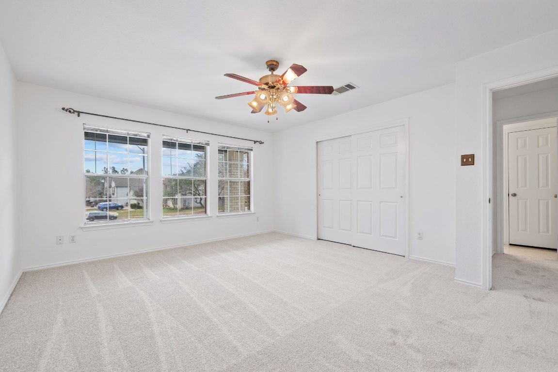 2210 Rachel Ridge Cedar Park, TX 78613 - Photo 29 of 40 a view of an empty room with chandelier fan