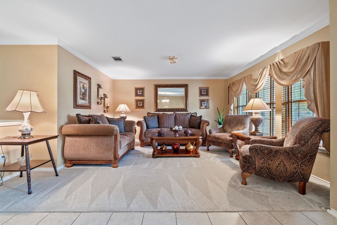 2210 Rachel Ridge Cedar Park, TX 78613 - Photo 4 of 40 a living room with furniture or couch and a window