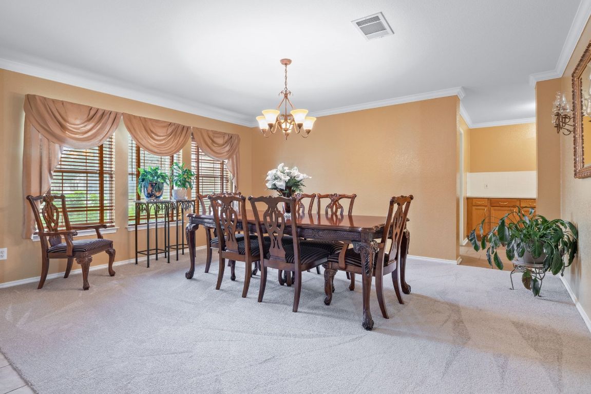 2210 Rachel Ridge Cedar Park, TX 78613 - Photo 6 of 40 a view of a dining room with furniture window and outside view