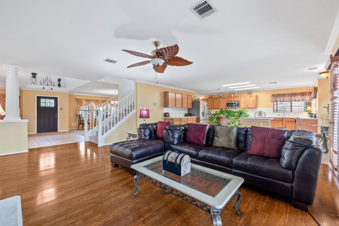 2210 Rachel Ridge Cedar Park, TX 78613 - Photo 10 of 40 a living room with furniture a ceiling fan and a rug
