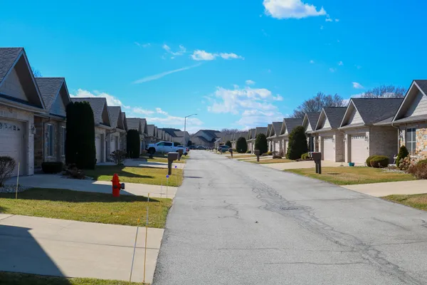 a view of a swimming pool with an outdoor seating