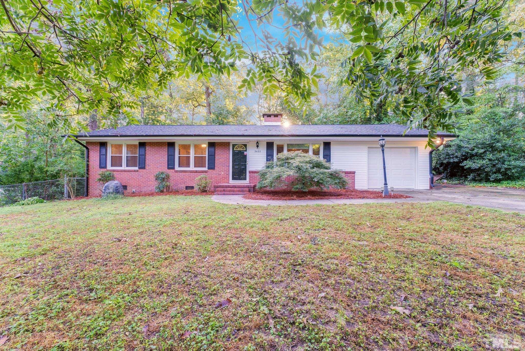 3422 Baugh Street Raleigh, NC 27604 - Photo 1 of 28 front view of a house with a yard