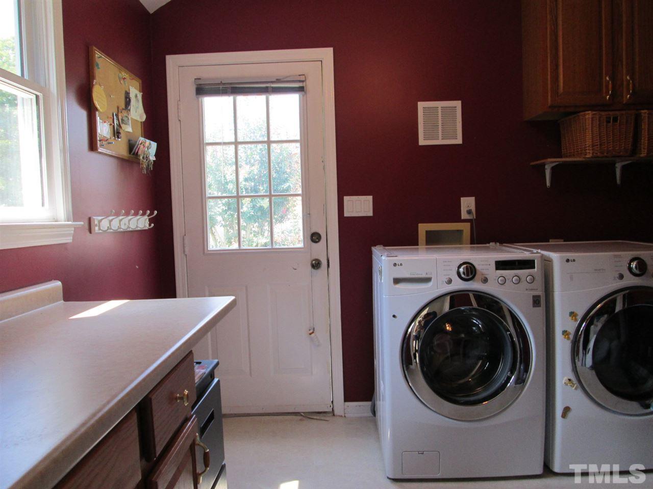 7001 Kiger Road Rougemont, NC 27572 - Photo 12 of 25 a utility room with dryer and washer