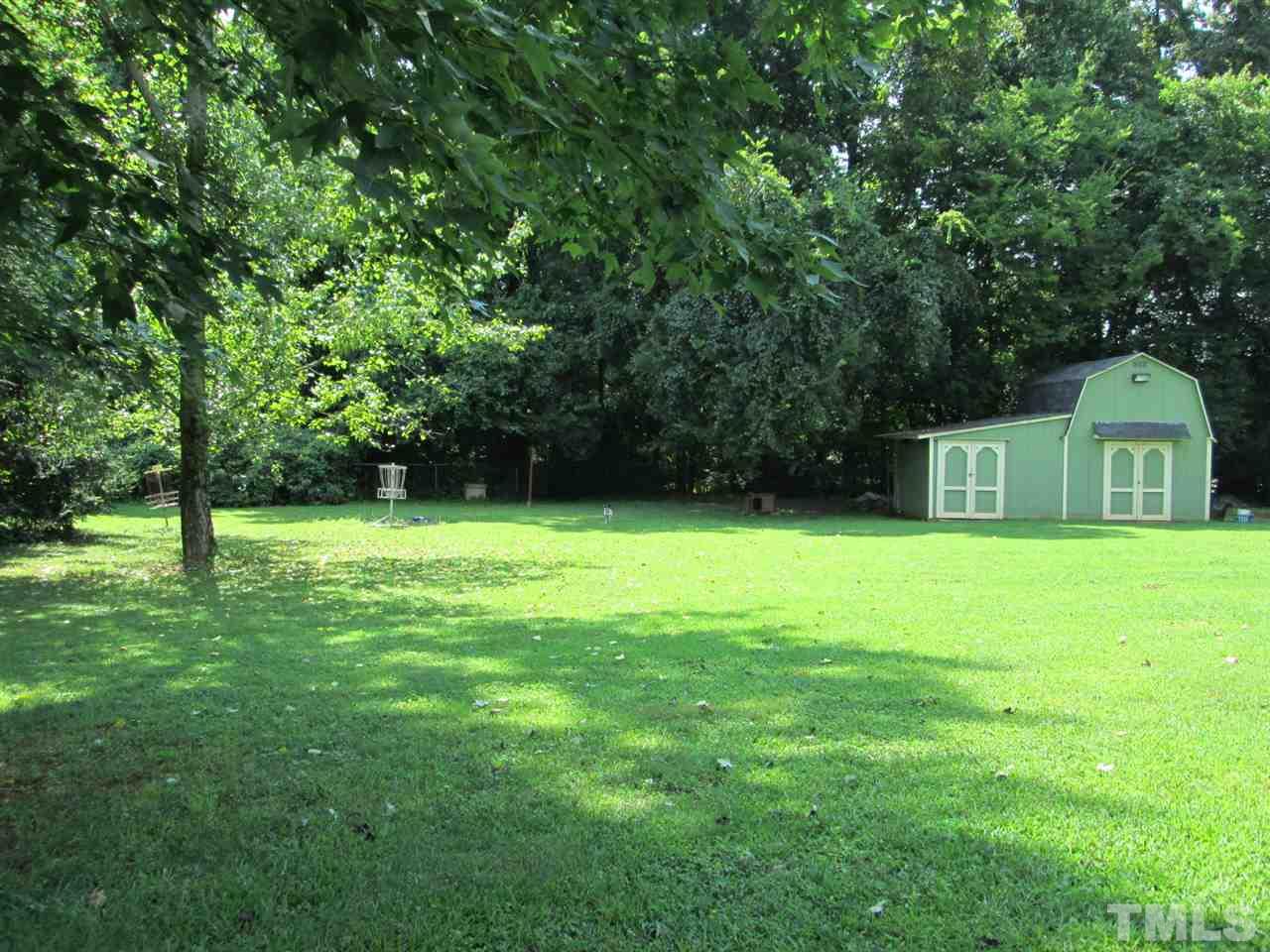 7001 Kiger Road Rougemont, NC 27572 - Photo 21 of 25 a house view with a outdoor space