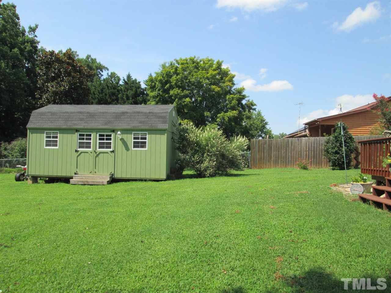 7001 Kiger Road Rougemont, NC 27572 - Photo 23 of 25 a view of a back yard of the house