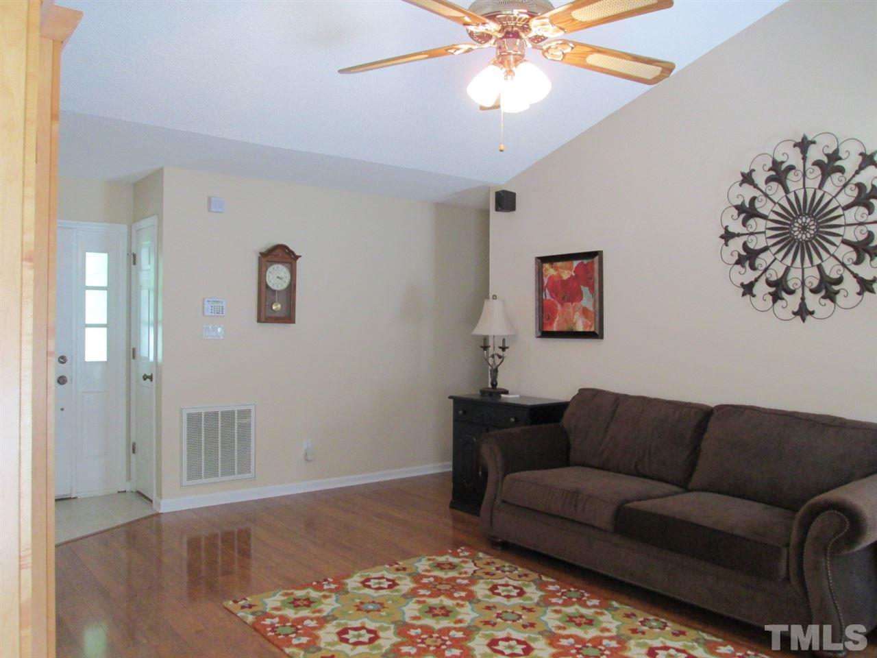 7001 Kiger Road Rougemont, NC 27572 - Photo 4 of 25 a living room with furniture and a wooden floor