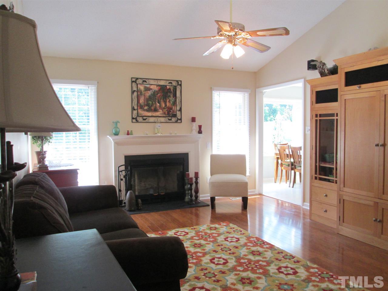 7001 Kiger Road Rougemont, NC 27572 - Photo 5 of 25 a living room with furniture and a fireplace