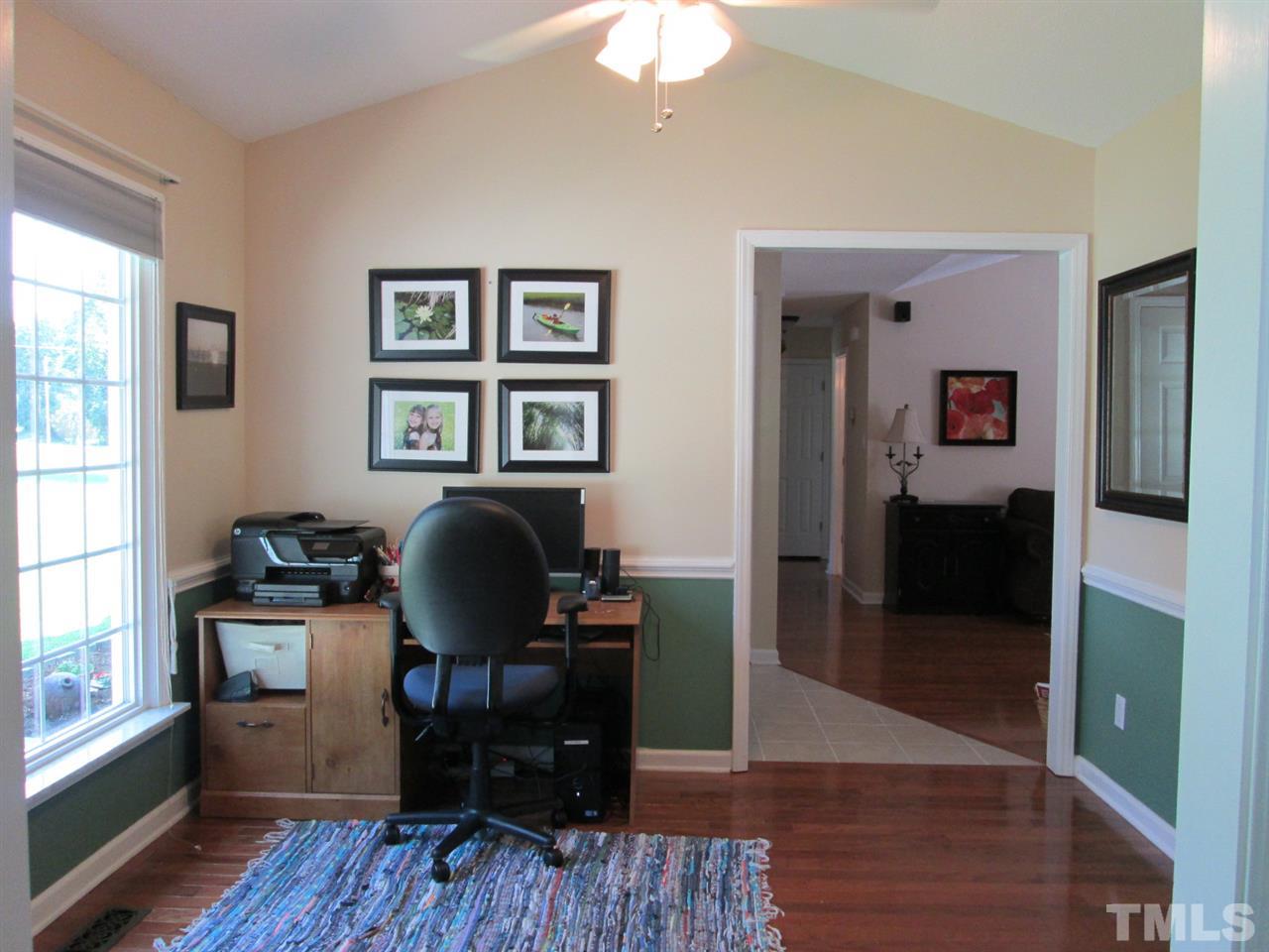 7001 Kiger Road Rougemont, NC 27572 - Photo 6 of 25 a view of a workspace with wooden floor and a window