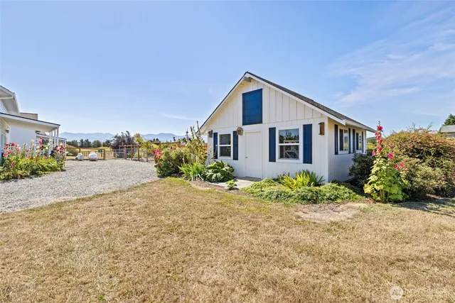 a view of a yard with ocean view